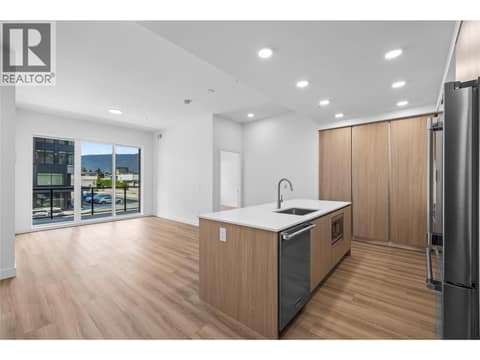 Kitchen, Dining and Living Room - Photos of a similar home in the community. at 2760 Olalla Road Unit# 208, Lakeview Heights, West Kelowna