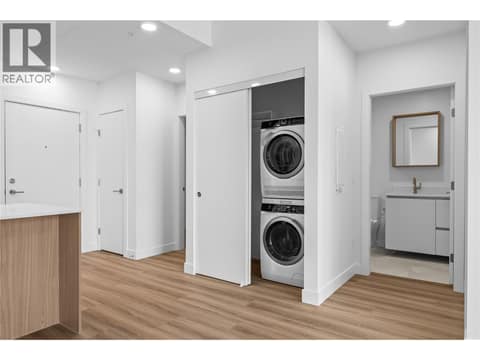 Laundry and Foyer - Photos of a similar home in the community. at 2760 Olalla Road Unit# 208, Lakeview Heights, West Kelowna