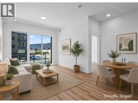 Living Room and Dining Room - virtually staged to show possibilities. Photos of a similar home in the community. at 2760 Olalla Road Unit# 208, Lakeview Heights, West Kelowna