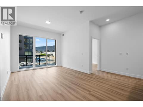 Living Room and Dining Room - Photos of a similar home in the community. at 2760 Olalla Road Unit# 208, Lakeview Heights, West Kelowna