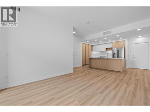 Living Room and Kitchen - Photos of a similar home in the community. at 2760 Olalla Road Unit# 208, Lakeview Heights, West Kelowna