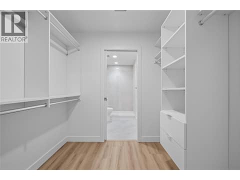 Walk-through Closet - Photos of a similar home in the community. at 2760 Olalla Road Unit# 208, Lakeview Heights, West Kelowna