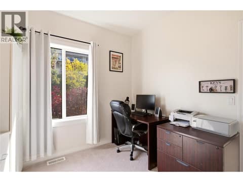 Den/office or 3rd bedroom (main floor) at 724 Lone Pine Drive, Black Mountain, Kelowna