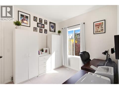 Den/office or 3rd bedroom (main floor) at 724 Lone Pine Drive, Black Mountain, Kelowna