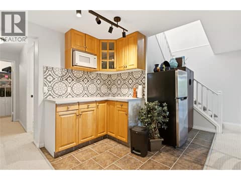 Downstairs wet bar with excellent suite potential at 724 Lone Pine Drive, Black Mountain, Kelowna