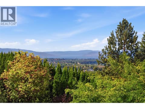 Lake + City views at 724 Lone Pine Drive, Black Mountain, Kelowna