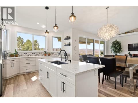 Main-Floor Living Framed by a Wall of Windows at 724 Lone Pine Drive, Black Mountain, Kelowna