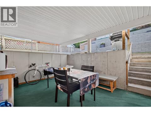 Around Back, Covered Patio into the Legal Suite at 1212 Cerise Drive, Glenmore, Kelowna