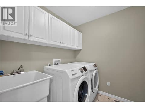 Main Floor Laundry at 1212 Cerise Drive, Glenmore, Kelowna
