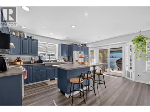 Updated Kitchen with Custom Concrete Countertops at 1212 Cerise Drive, Glenmore, Kelowna