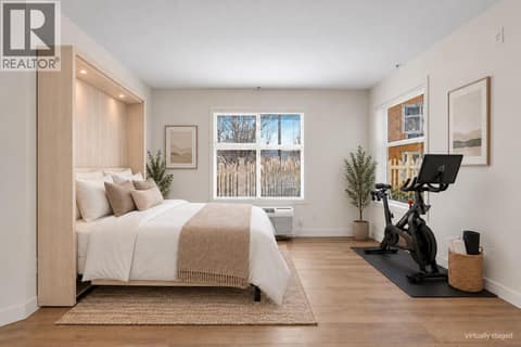 Virtually staged option with murphy bed + peleton at 533 Yates Road Unit# 100, North Glenmore, Kelowna