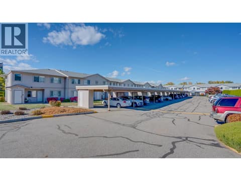 Covered parking and visitor parking at 4740 20 Street Unit# 99, Harwood, Vernon