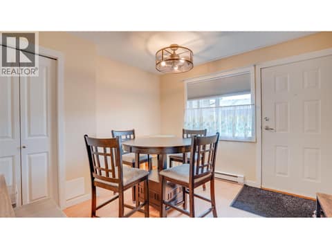 Dining area and front entry at 4740 20 Street Unit# 99, Harwood, Vernon