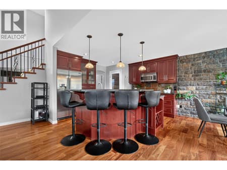Spacious kitchen offering a functional layout for everyday cooking, family meals, and entertaining guests. at 2512 Selkirk Drive, Dilworth Mountain, Kelowna