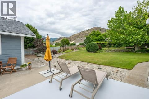 Back patio between main house and guest house at 860 Fairview Road, Oliver