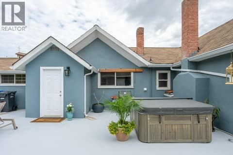 Courtyard facing main house & hot tub at 860 Fairview Road, Oliver