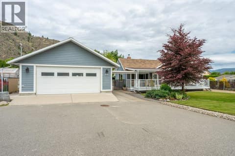Front of home at 860 Fairview Road, Oliver