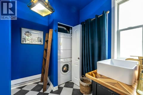 Guest house bathroom with laundry at 860 Fairview Road, Oliver