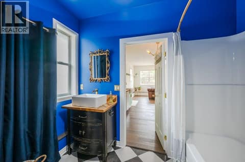 Guest house bathroom with laundry at 860 Fairview Road, Oliver