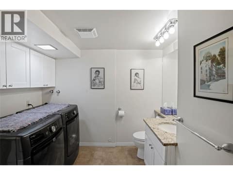 Lower level bathroom/laundry room at 1988 Dewdney Road, McKinley Landing, Kelowna