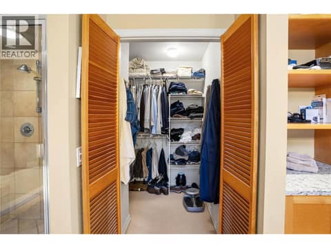 Primary Walk-in closet at 1988 Dewdney Road, McKinley Landing, Kelowna