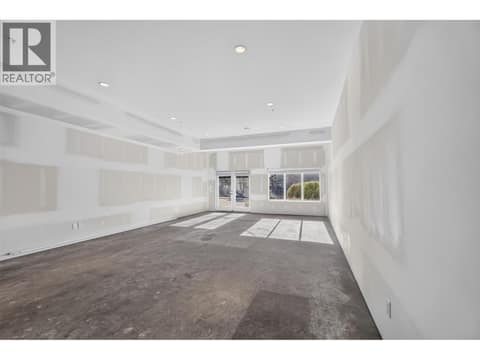 1,036 sq. ft. of versatile street-level space with 10-foot ceilings, ideal for a home-based business or additional recreational living space! at 12840 Stillwater Court Unit# 11, Lake Country North West