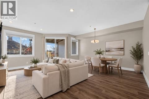Open-concept living and dining area, perfect for everyday living and entertaining! ++ Virtually Staged at 12840 Stillwater Court Unit# 11, Lake Country North West