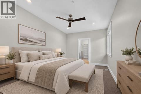 Spacious primary bedroom with plenty of room to relax and unwind! at 12840 Stillwater Court Unit# 11, Lake Country North West