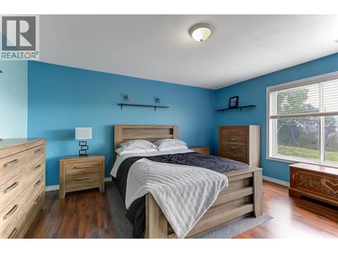 In-law suite bedroom at 2280 Shannon Hills Drive, Shannon Lake, West Kelowna