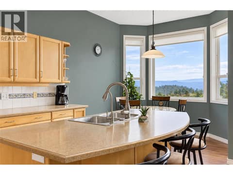 Kitchen to nook at 2280 Shannon Hills Drive, Shannon Lake, West Kelowna