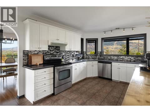 Main Home: Upper Level Kitchen at 152 Lindsay Road, Middleton Mountain Vernon