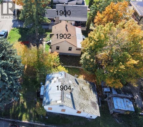 Aerial view of 3 properties looking south with numbers noting the addresses. at 1900-1902-1904 31 Street, City of Vernon