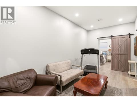 Downstairs Inlaw TV Room at 1030 Skeena Drive, Dilworth Mountain, Kelowna