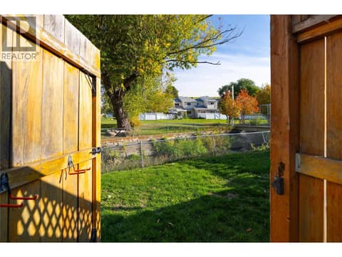 Gate to further greenspace at 4910 25 Avenue Unit# 24, Okanagan Landing, Vernon