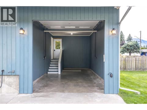 Attached Garage - VIRTUALLY CLEANED with access to downstairs, kitchen and backyard. at 1669 Hiob Road, Revelstoke