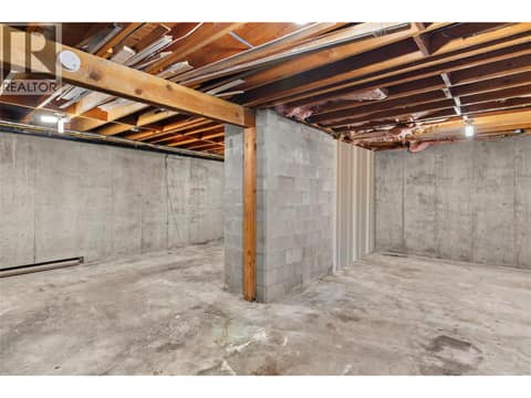 Downstairs - VIRTUALLY CLEANED unfinished room at 1669 Hiob Road, Revelstoke