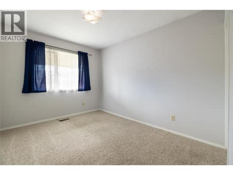 Large second bedroom at 3900 27 Avenue Unit# 2, Westmount, Vernon