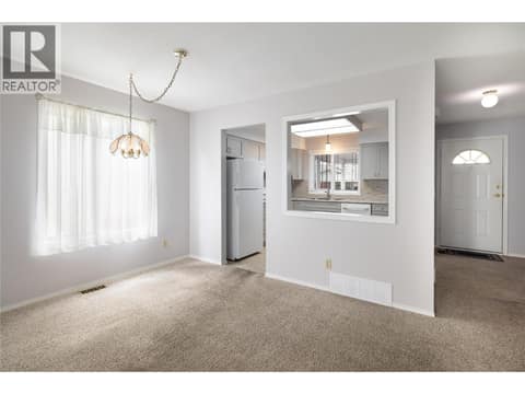 Pass through to dining room at 3900 27 Avenue Unit# 2, Westmount, Vernon