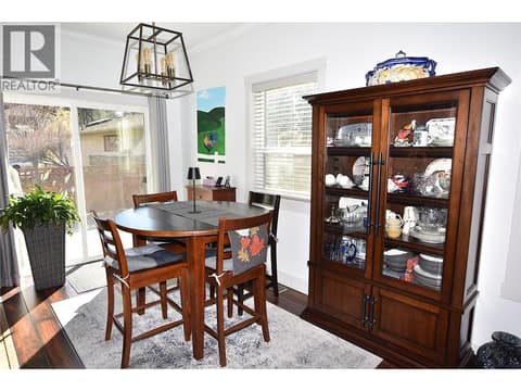 Dining space with sliders to back patio at 259 Grouse Avenue, Okanagan North, Vernon