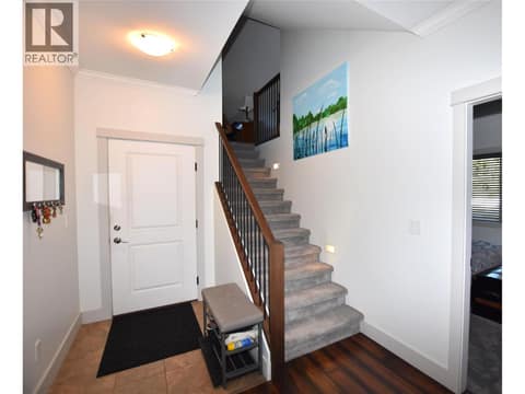 Stairs up to the bonus room at 259 Grouse Avenue, Okanagan North, Vernon