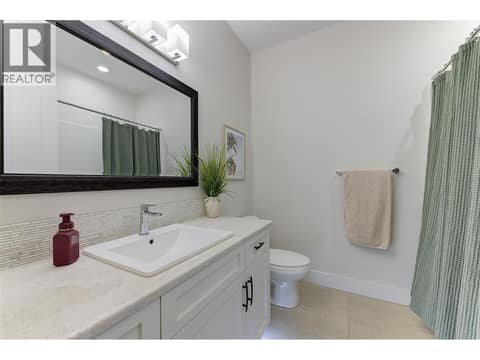 Main floor 4 piece bathroom at 13371 Apex Lane, Lake Country East / Oyama