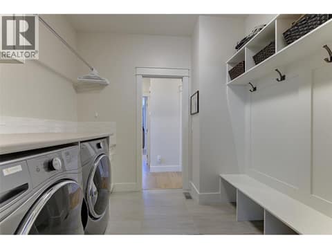 Mud room with bench seating and cubby holes for all your stuff :) at 13371 Apex Lane, Lake Country East / Oyama