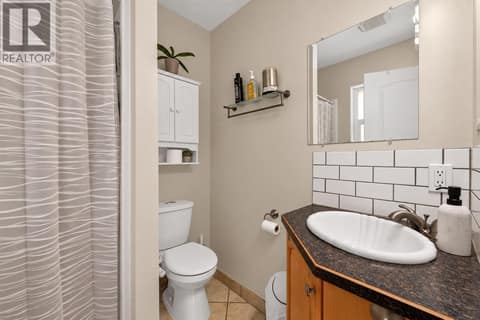 Primary Ensuite Photo has been altered with AI to show neutral colour scheme at 2045 Valleyview Drive, Valleyview, Kamloops