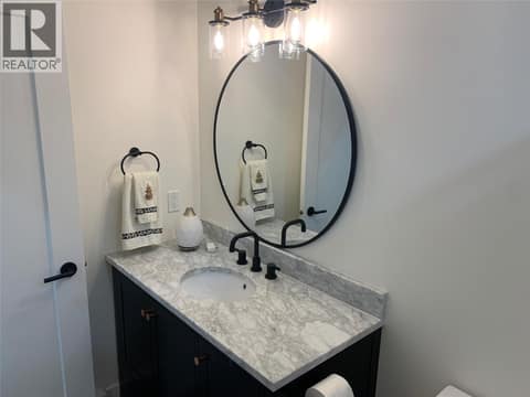 Bathroom of the Suite (photo from when the suite was vacant) at 7151 Apex Drive, Foothills, Vernon
