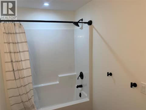 Bathroom of the Suite (photo from when the suite was vacant) at 7151 Apex Drive, Foothills, Vernon