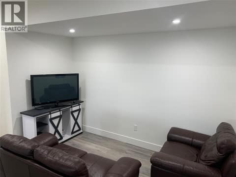 Living Room of the Suite (photo from when the suite was vacant) at 7151 Apex Drive, Foothills, Vernon
