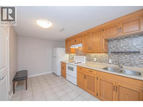 Kitchen in basement at 7126 Longacre Drive, Okanagan Landing, Vernon