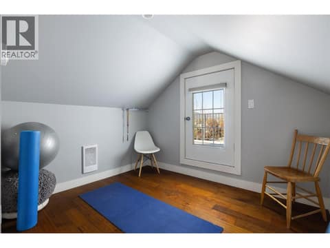 Fitness area, door to roof top deck at 4004 Pleasant Valley Road, Harwood, Vernon