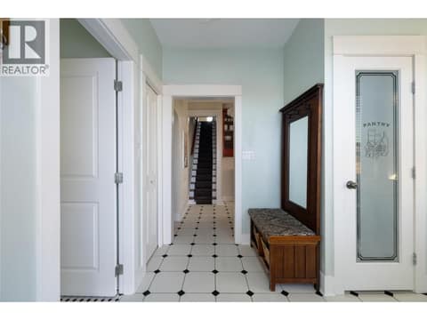 Rear entry, main bath on left, pantry, laundry on right at 4004 Pleasant Valley Road, Harwood, Vernon