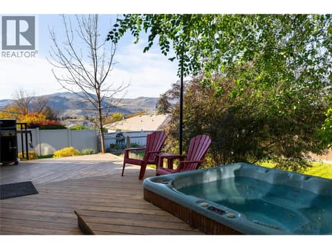 Soak away your day in the private hot tub at 4004 Pleasant Valley Road, Harwood, Vernon